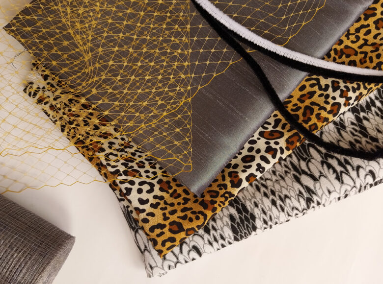 Fotografia przedstawia różnego rodzaju, kolorowe materiały.